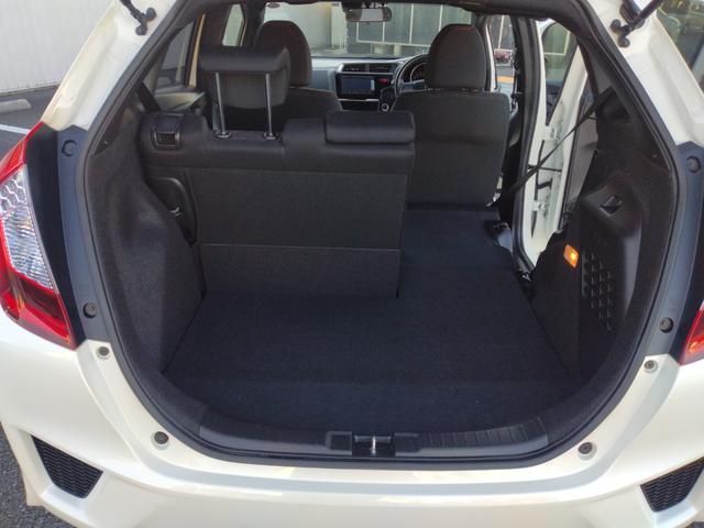 フィットハイブリッド Sパッケージ LEDヘットライト メモリナビ DVD再生 BTオーディオ ワンセグテレビ ナビTV リアカメラ クルコン Wエアバック Dレコ ETC付 イモビライザー オートライト 衝突安全ボディ 電動格納ミラー(34枚目)