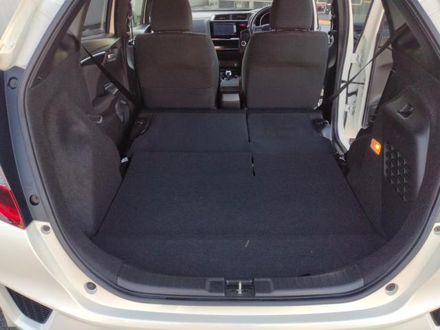 フィットハイブリッド Sパッケージ LEDヘットライト メモリナビ DVD再生 BTオーディオ ワンセグテレビ ナビTV リアカメラ クルコン Wエアバック Dレコ ETC付 イモビライザー オートライト 衝突安全ボディ 電動格納ミラー(35枚目)