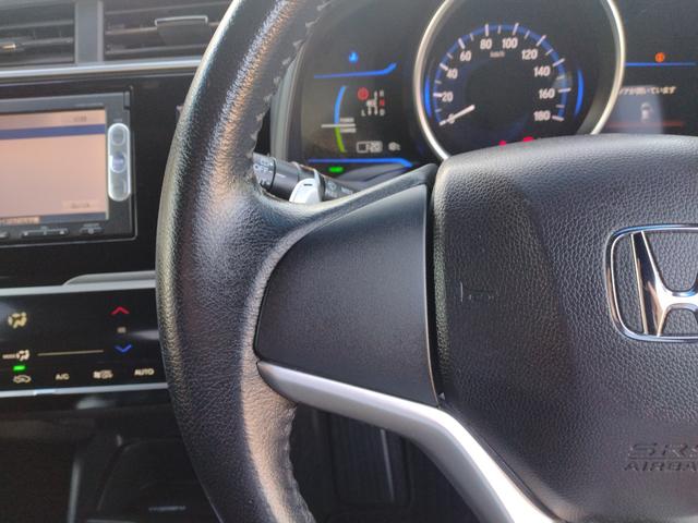 フィットハイブリッド Sパッケージ LEDヘットライト メモリナビ DVD再生 BTオーディオ ワンセグテレビ ナビTV リアカメラ クルコン Wエアバック Dレコ ETC付 イモビライザー オートライト 衝突安全ボディ 電動格納ミラー(58枚目)