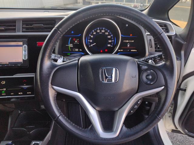 フィットハイブリッド Sパッケージ LEDヘットライト メモリナビ DVD再生 BTオーディオ ワンセグテレビ ナビTV リアカメラ クルコン Wエアバック Dレコ ETC付 イモビライザー オートライト 衝突安全ボディ 電動格納ミラー(59枚目)