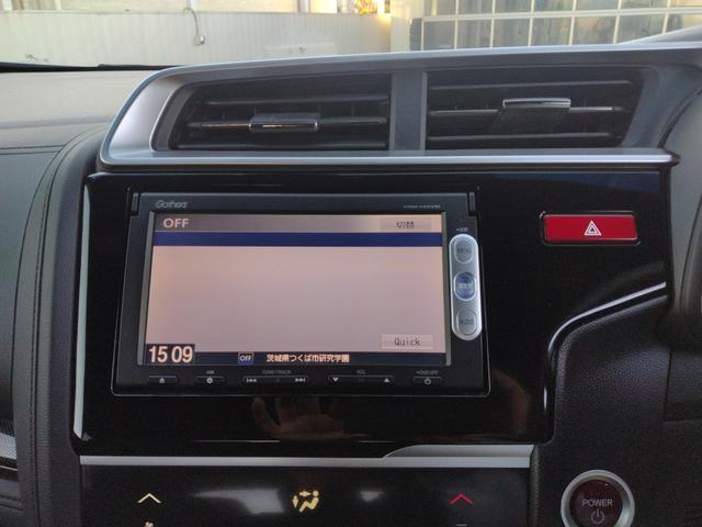 フィットハイブリッド Sパッケージ LEDヘットライト メモリナビ DVD再生 BTオーディオ ワンセグテレビ ナビTV リアカメラ クルコン Wエアバック Dレコ ETC付 イモビライザー オートライト 衝突安全ボディ 電動格納ミラー(66枚目)