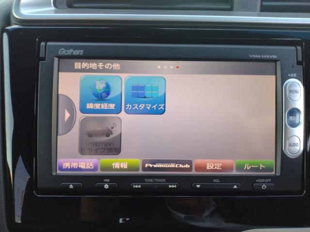 フィットハイブリッド Sパッケージ LEDヘットライト メモリナビ DVD再生 BTオーディオ ワンセグテレビ ナビTV リアカメラ クルコン Wエアバック Dレコ ETC付 イモビライザー オートライト 衝突安全ボディ 電動格納ミラー(72枚目)