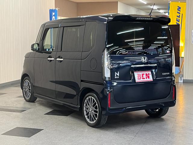 N-BOXカスタム ターボ カスタムターボ_両側パワースライドドア_シートヒーター_ハーフレザー ステアリングスイッチ スマートキー 電動格納ミラー 純正アルミホイール ベンチシート シートバックテーブル LEDヘッドライト(7枚目)