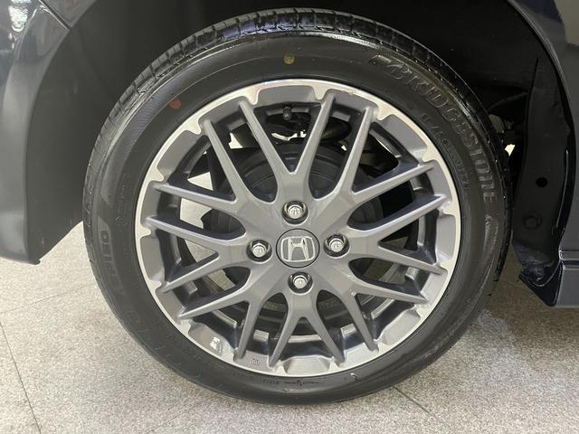 N-BOXカスタム ターボ カスタムターボ_両側パワースライドドア_シートヒーター_ハーフレザー ステアリングスイッチ スマートキー 電動格納ミラー 純正アルミホイール ベンチシート シートバックテーブル LEDヘッドライト(39枚目)