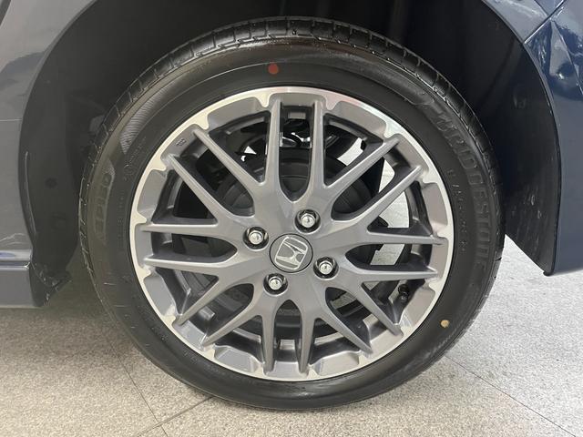 N-BOXカスタム ターボ カスタムターボ_両側パワースライドドア_シートヒーター_ハーフレザー ステアリングスイッチ スマートキー 電動格納ミラー 純正アルミホイール ベンチシート シートバックテーブル LEDヘッドライト(42枚目)