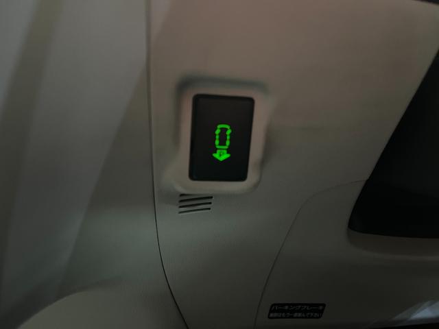 プリウス Ｇ　Ｇ＿エアロパーツ＿純正ＨＤＤナビ／バックモニター／ＣＤ＿ビルトインＥＴＣ　ステアリングスイッチ　オートライト　スマートキー　純正アルミホイール　電動格納ミラー　トノカバー（22枚目）