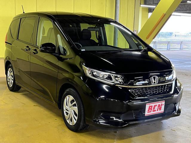 フリード Ｇ　６人乗り　走行：２６０００キロ　ホンダセンシング　ナビ　ＴＶ　Ｂｌｕｅｔｏｏｔｈ　ＤＶＤ再生　ＥＴＣ　前席シートヒーター　バックカメラ　両側パワースライドドア　プッシュスタート　キーフリー　ＬＥＤ（3枚目）