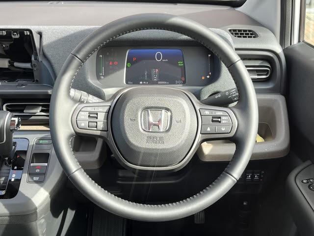 フリード ｅ：ＨＥＶエアー　ＥＸ　登録届出済未使用車　６人乗り　車検：令和１０年１１月　衝突軽減　電動パーキング　ブレーキオートホールド　両側パワースライドドア　プッシュスタート　キーフリー　ＬＥＤヘッドライト（14枚目）