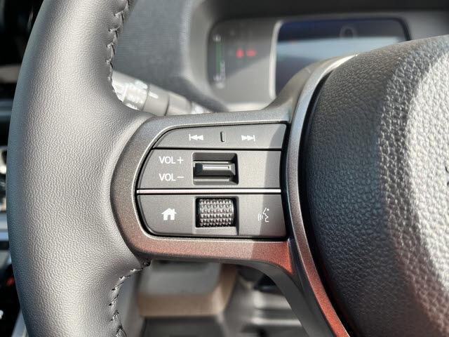 フリード ｅ：ＨＥＶエアー　ＥＸ　登録届出済未使用車　６人乗り　車検：令和１０年１１月　衝突軽減　電動パーキング　ブレーキオートホールド　両側パワースライドドア　プッシュスタート　キーフリー　ＬＥＤヘッドライト（15枚目）