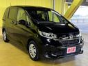 フリード Ｇ　６人乗り　走行：２６０００キロ　ホンダセンシング　ナビ　ＴＶ　Ｂｌｕｅｔｏｏｔｈ　ＤＶＤ再生　ＥＴＣ　前席シートヒーター　バックカメラ　両側パワースライドドア　プッシュスタート　キーフリー　ＬＥＤ（3枚目）