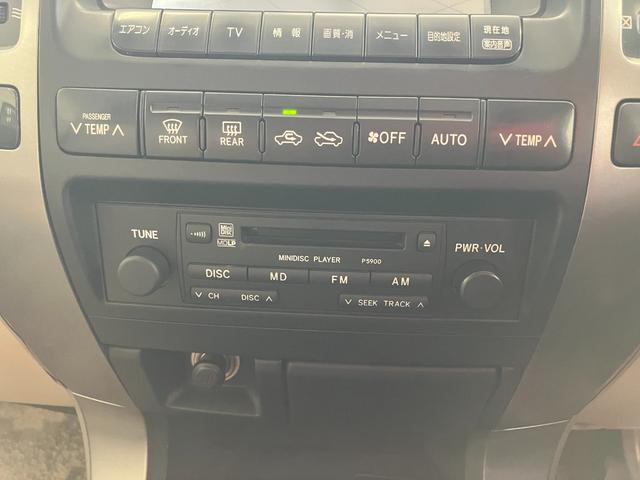ランドクルーザープラド TX 4WD バックカメラ ナビ アルミホイール キーレスエントリー 電動格納ミラー AT 盗難防止システム 衝突安全ボディ CD MD 3列シート ABS エアコン パワーステアリング パワーウィンドウ(7枚目)