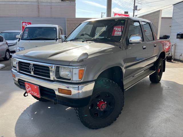 ハイラックスピックアップ ダブルキャブ　ＳＳＲ　４ＷＤ　ＭＴ　エアコン　ＣＤ　カセット	スペアキー有り　タイミングベルトＨ２８年６月１５日８４，０００ｋｍ時交換ステッカー有り　５速マニュアル車両　４ＷＤ　社外１５インチ　社外オーディオ　ＣＤ　ラジオ（11枚目）