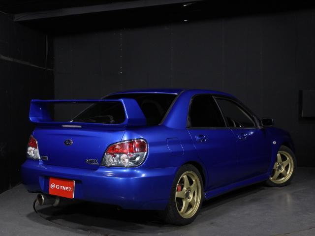 インプレッサ ＷＲＸ　ＷＲ－リミテッド　２００５　ＨＩＤ　キーレス　ＳＴＩゲノムマフラー　純正１７ＡＷ　ＥＴＣ　ＡＣデルコセキュリティ　４ＷＤ　ターボ　５速ＭＴ（2枚目）