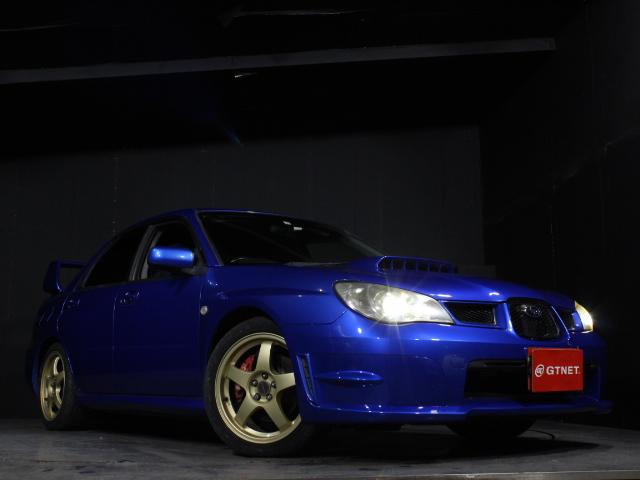 インプレッサ ＷＲＸ　ＷＲ－リミテッド　２００５　ＨＩＤ　キーレス　ＳＴＩゲノムマフラー　純正１７ＡＷ　ＥＴＣ　ＡＣデルコセキュリティ　４ＷＤ　ターボ　５速ＭＴ（43枚目）