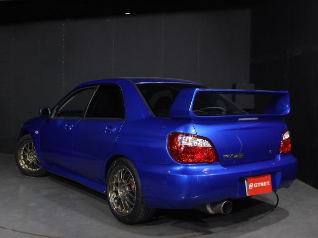 ＷＲＸ　２００４　Ｖリミテッド　ストラーダＨＤＤナビ　バックカメラ　ＥＴＣ　ＭＯＭＯステアリング　テイン車高調フレックスＺ　レイズボルクレーシングＳＥ３７Ｋ１７ＡＷ　ＨＫＳエアクリ　ブリッツラジエーター　ＳＴＩゲノムマフラー(4枚目)