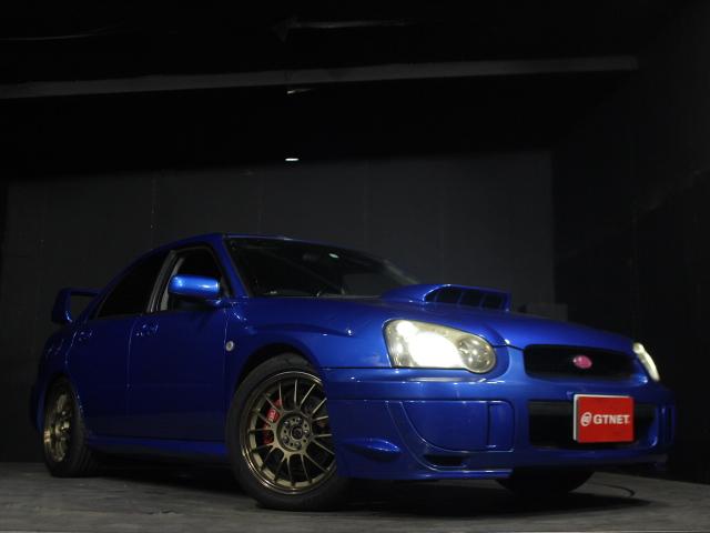 ＷＲＸ　２００４　Ｖリミテッド　ストラーダＨＤＤナビ　バックカメラ　ＥＴＣ　ＭＯＭＯステアリング　テイン車高調フレックスＺ　レイズボルクレーシングＳＥ３７Ｋ１７ＡＷ　ＨＫＳエアクリ　ブリッツラジエーター　ＳＴＩゲノムマフラー(44枚目)