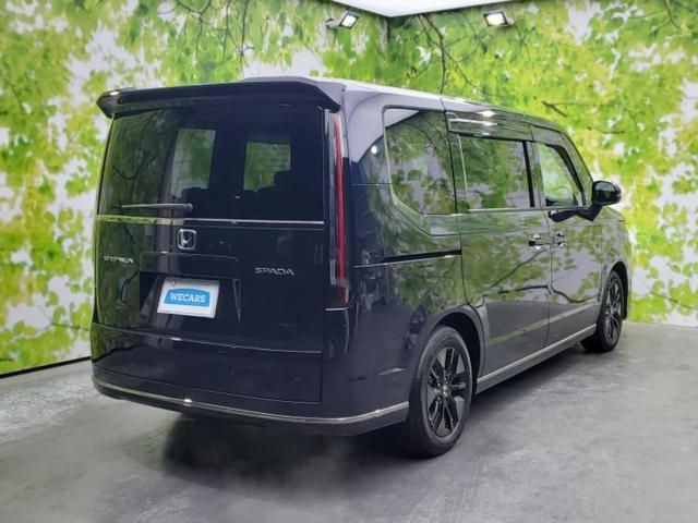 ステップワゴン スパーダ　保証書／純正　９インチ　ＳＤナビ／フリップダウンモニター　純正　１５．６インチ／ホンダセンシング／両側電動スライドドア／シートヒーター　前席／車線逸脱防止支援システム／シート　ハーフレザー　禁煙車（3枚目）