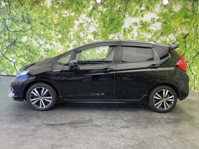 フィットハイブリッド ハイブリッド・Ｓホンダセンシング　保証書／純正　８インチ　ナビ／ホンダセンシング／車線逸脱防止支援システム／ヘッドランプ　ＬＥＤ／ＵＳＢジャック／Ｂｌｕｅｔｏｏｔｈ接続／ＥＴＣ／ＥＢＤ付ＡＢＳ／横滑り防止装置／アイドリングストップ（2枚目）