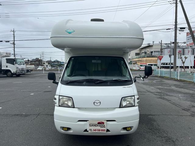 ボンゴトラック 4WD ガソリン車なので何処でも登録できます。Tベルト交換済み シンク ガス2口 トイレ 洗面所冷蔵庫 TV サイドオーニング(2枚目)