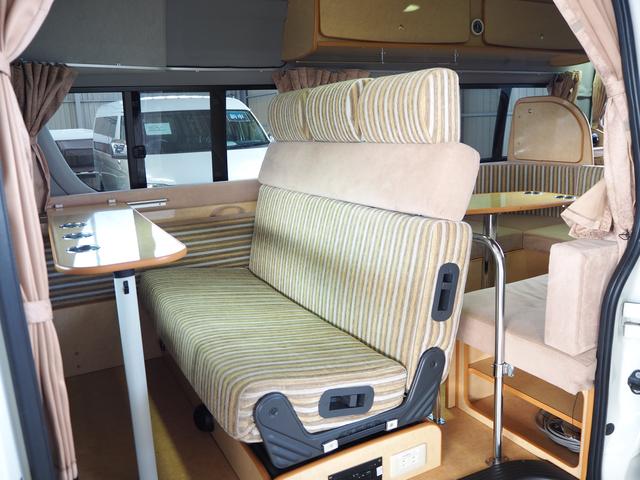 キャンピングカー ハイエース3型 ノースライフ製トラベルスター FFヒーター ツインサブ 後部モニター マックスファン 網戸3枚 シェード シンク カセットコンロ 9名乗車3名就寝 新品タイヤ(5枚目)