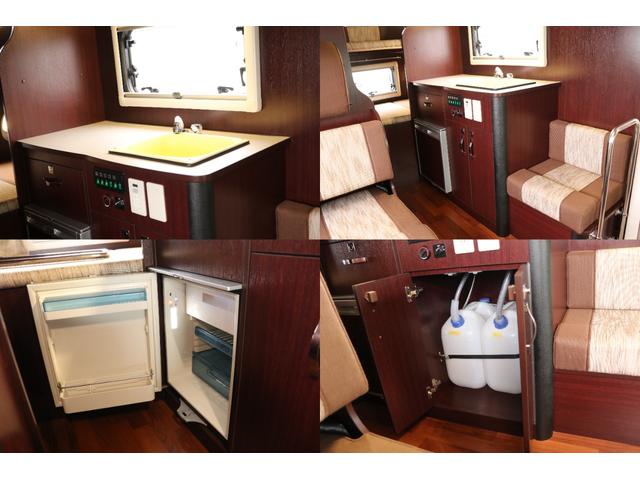ナッツRV製 クレソンボヤージュW 1オーナー禁煙車 ナビTV ETC Bカメラ サブBT VOTRONIC 12V/100V 燃料式FFヒーター 走行時リアクーラー MAXFAN シンク 冷蔵庫 リアラダー カセットトイレ 外部充電 走行充電(8枚目)