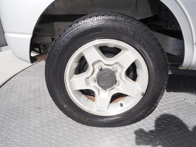 ジムニー XC ルーフレール 背面タイヤ フェンダーミラー 純正16インチアルミ 社外オーディオ CD ターボ 4WD 取扱説明書(14枚目)