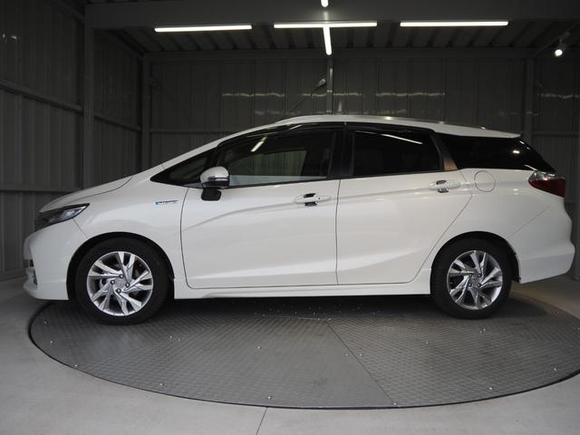 シャトル ハイブリッドZ ワンオーナー 禁煙車 ルーフレール ハーフレザー 前席シートヒーター 純正SDナビ バックカメラ コンフォートビューパッケージ ETC スマートキー2個 クルコン パドルシフト ECON LEDヘッドライト 純正16AW(7枚目)