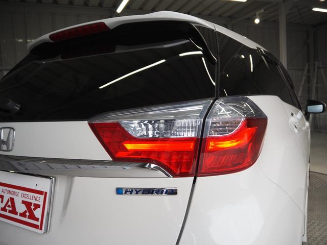 シャトル ハイブリッドZ ワンオーナー 禁煙車 ルーフレール ハーフレザー 前席シートヒーター 純正SDナビ バックカメラ コンフォートビューパッケージ ETC スマートキー2個 クルコン パドルシフト ECON LEDヘッドライト 純正16AW(12枚目)