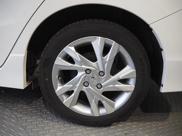 シャトル ハイブリッドZ ワンオーナー 禁煙車 ルーフレール ハーフレザー 前席シートヒーター 純正SDナビ バックカメラ コンフォートビューパッケージ ETC スマートキー2個 クルコン パドルシフト ECON LEDヘッドライト 純正16AW(22枚目)