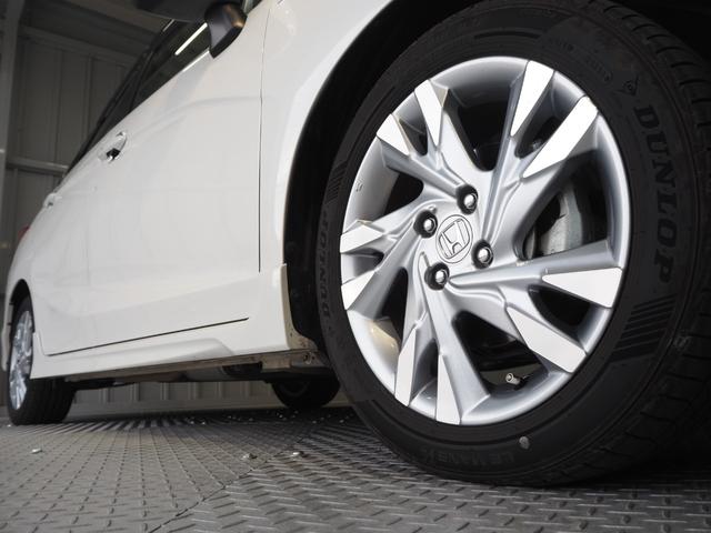 シャトル ハイブリッドZ ワンオーナー 禁煙車 ルーフレール ハーフレザー 前席シートヒーター 純正SDナビ バックカメラ コンフォートビューパッケージ ETC スマートキー2個 クルコン パドルシフト ECON LEDヘッドライト 純正16AW(52枚目)