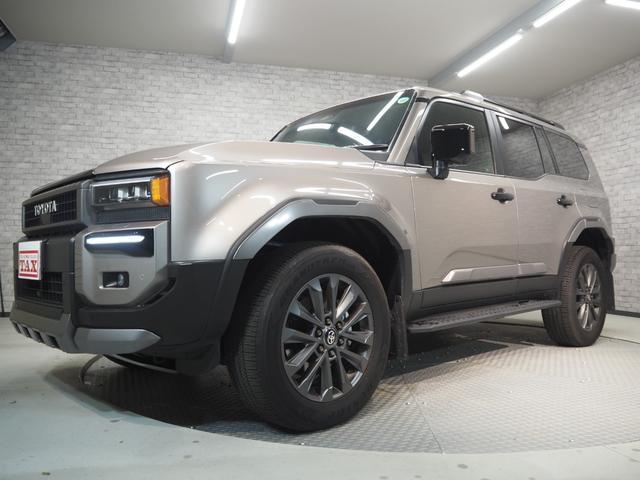 ランドクルーザー250 ZX ワンオーナー 禁煙車 サンルーフ 茶革シート 純正ナビ ルーフレール 前席&2列目シートヒーター・シートベンチレーション ステアリングヒーター パワーバックドア モデリスタプロテクターキット パノラミックビュー セーフティセンス 置くだけ充電 ETC(67枚目)