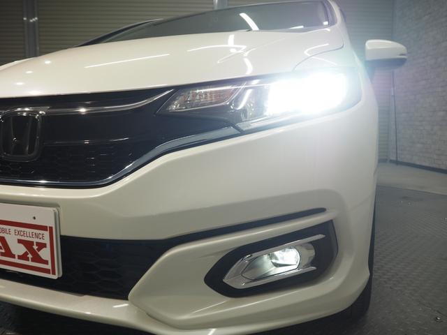 フィットハイブリッド Ｆ　禁煙車　純正ＳＤナビ　Ｂカメラ　禁煙車　純正ＳＤナビ　Ｂカメラ　ホンダセンシング　ＣＭＢＳ　路外逸脱抑制機能　レーダークルーズ　Ｆパッケージ　ＣＤ　ＤＶＤ　ＢＴ　ＤＴＶ　ＥＴＣ　社外前後ドラレコ　ＥＣＯＮ（11枚目）