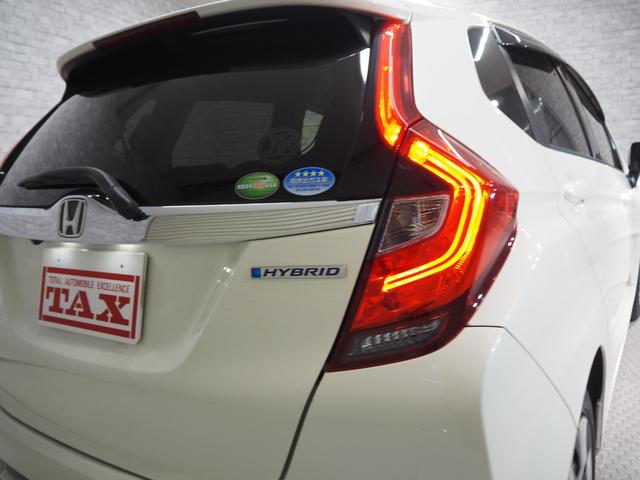 フィットハイブリッド Ｆ　禁煙車　純正ＳＤナビ　Ｂカメラ　禁煙車　純正ＳＤナビ　Ｂカメラ　ホンダセンシング　ＣＭＢＳ　路外逸脱抑制機能　レーダークルーズ　Ｆパッケージ　ＣＤ　ＤＶＤ　ＢＴ　ＤＴＶ　ＥＴＣ　社外前後ドラレコ　ＥＣＯＮ（12枚目）