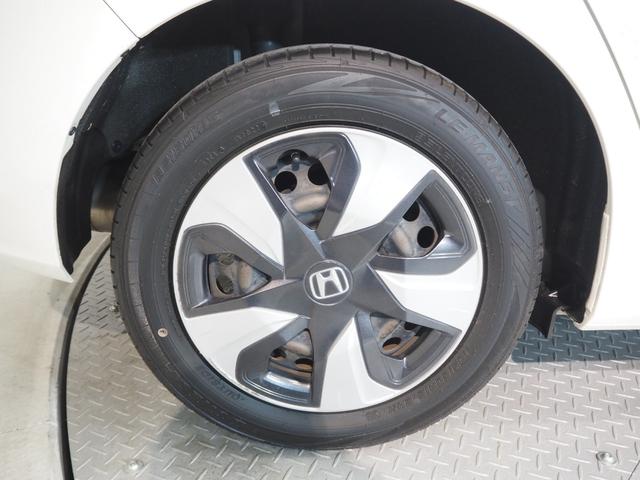 フィットハイブリッド Ｆ　禁煙車　純正ＳＤナビ　Ｂカメラ　禁煙車　純正ＳＤナビ　Ｂカメラ　ホンダセンシング　ＣＭＢＳ　路外逸脱抑制機能　レーダークルーズ　Ｆパッケージ　ＣＤ　ＤＶＤ　ＢＴ　ＤＴＶ　ＥＴＣ　社外前後ドラレコ　ＥＣＯＮ（18枚目）