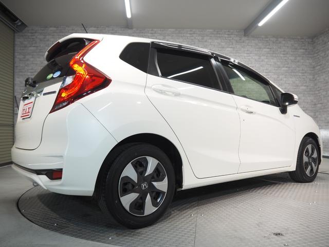 フィットハイブリッド Ｆ　禁煙車　純正ＳＤナビ　Ｂカメラ　禁煙車　純正ＳＤナビ　Ｂカメラ　ホンダセンシング　ＣＭＢＳ　路外逸脱抑制機能　レーダークルーズ　Ｆパッケージ　ＣＤ　ＤＶＤ　ＢＴ　ＤＴＶ　ＥＴＣ　社外前後ドラレコ　ＥＣＯＮ（51枚目）