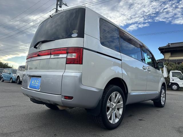 デリカD:5 G パワーパッケージ パワースライドドア 純正HDDナビゲーションシステム クルーズコントロール パドルシフト DVD再生可 バックサイドカメラ インテリジェントキー ETC フォグランプ 8人乗り タイミングチェーン(58枚目)