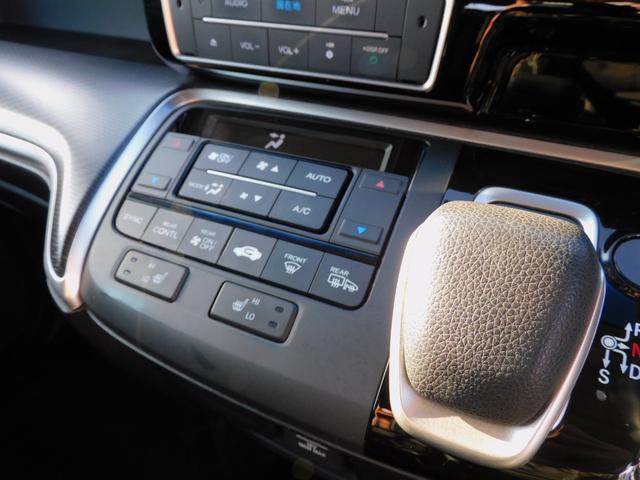 ステップワゴンスパーダ ｅ：ＨＥＶスパーダ　Ｇ・ＥＸ　ホンダセンシング　マルチビュー１０インチモニター　両側パワスラ　クルコン　ＥＴＣ　ＵＳＢ　衝突軽減　シートヒーター　ＤＶＤ再生　フルセグ地デジ　バックカメラ　インテリキー　ＥＴＣ　Ｂｌｕｅｔｏｏｔｈ　ハーフレザー（35枚目）