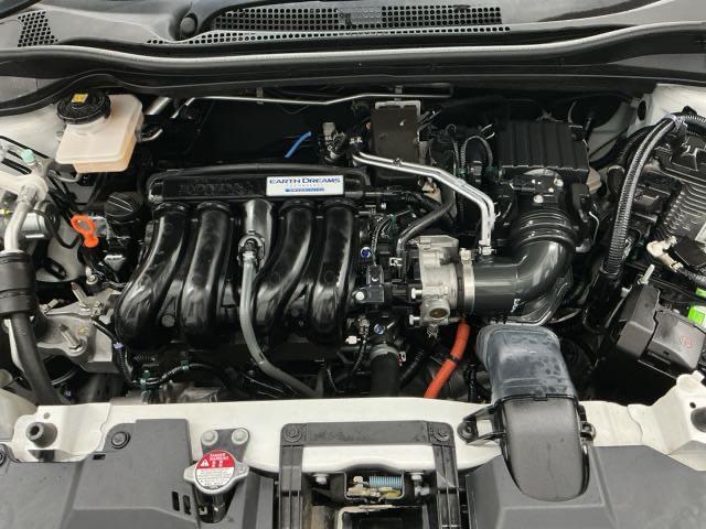 ヴェゼル ハイブリッドＺ・ホンダセンシング　ホンダ認定中古車　純正ナビ　ＬＥＤライト　レーダーサポート　Ｗエアコン　１オーナ－　ＤＶＤ再生機能　整備記録簿　横滑り防止システム　バックアイカメラ　盗難防止装置　フルセ　シートヒーター付　ナビ＆ＴＶ（19枚目）