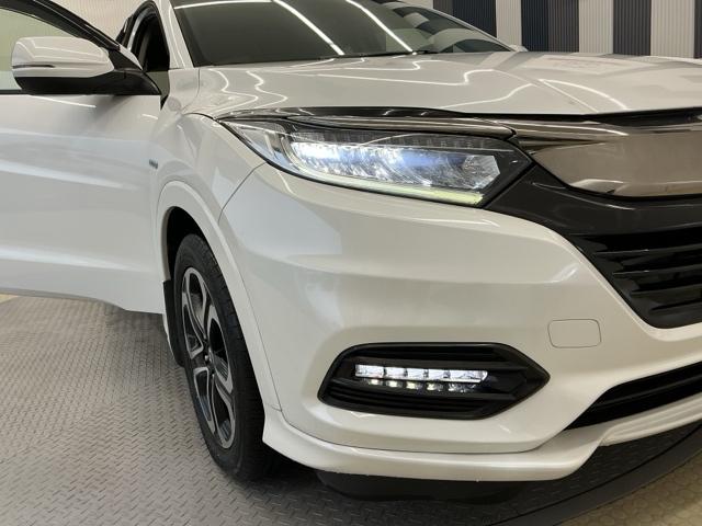 ヴェゼル ハイブリッドＺ・ホンダセンシング　ホンダ認定中古車　純正ナビ　ＬＥＤライト　レーダーサポート　Ｗエアコン　１オーナ－　ＤＶＤ再生機能　整備記録簿　横滑り防止システム　バックアイカメラ　盗難防止装置　フルセ　シートヒーター付　ナビ＆ＴＶ（23枚目）