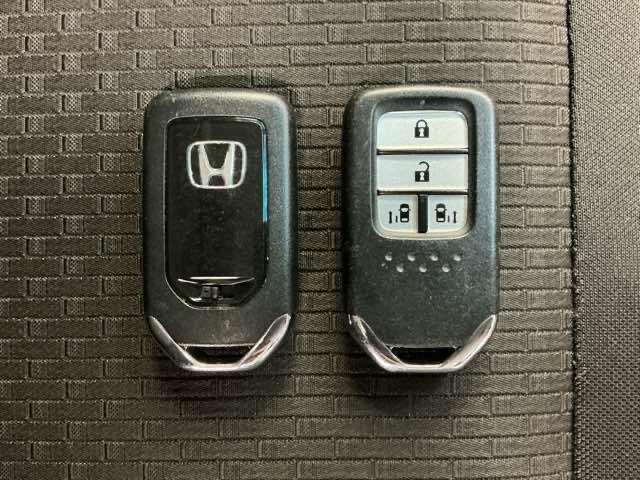 ステップワゴンスパーダ スパーダホンダセンシング ホンダ認定中古車 純正ドラレコ前後 盗難防止 助手席エアバッグ ワンオーナ- Wパワスラ 記録簿有 リアオートエアコン 地デジ LEDライト 横滑り防止システム オートエアコン リアカメラ ナビ&TV(18枚目)