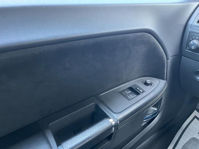 ダッジ・チャレンジャー SRT8 CARFAX走行証明/社外マフラー/ブレンボキャリパー/レーシングストライプ/ローダウン/392フロントスポイラー/アルコア鍛造20インチホイール/カロッツェリアナビ/専用レザーシート/(33枚目)