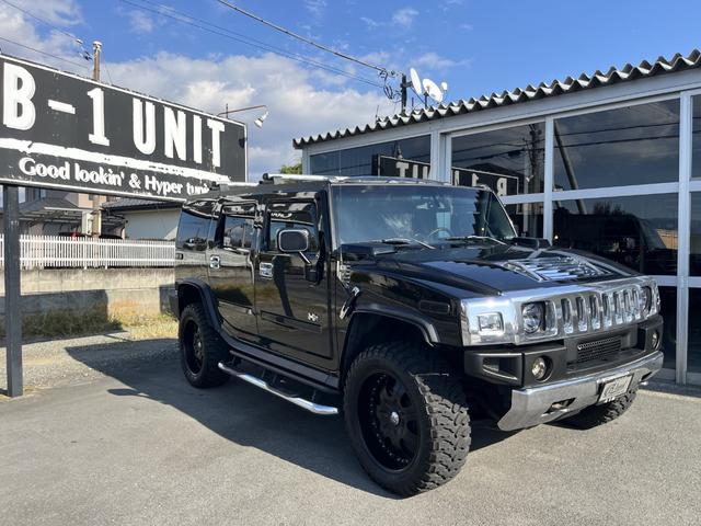 ハマーH2 ラグジュアリーパッケージ 新車並行/後期黒レザー/4本出しマフラー/ジオバンナ22インチ/LEDテール/バネサス/アルパインフリップダウンモニター/ドラレコ&レーダー/LEDヘッドライト&ナビ/LEDルーフマーカー(2枚目)