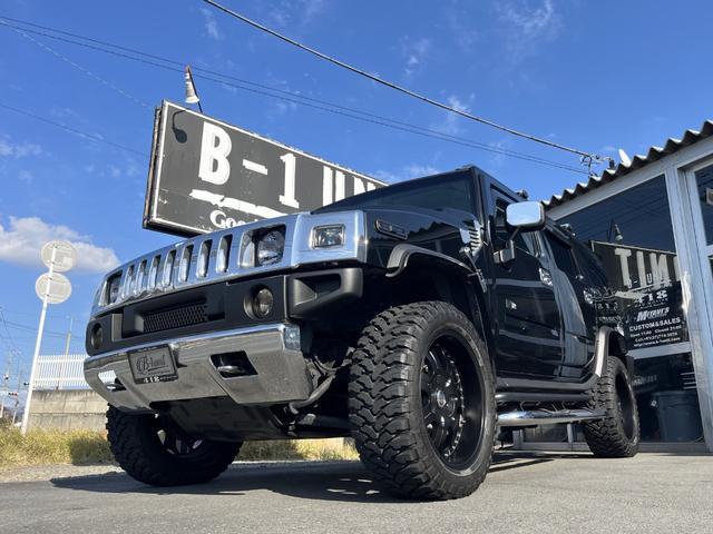 ハマーH2 ラグジュアリーパッケージ 新車並行/後期黒レザー/4本出しマフラー/ジオバンナ22インチ/LEDテール/バネサス/アルパインフリップダウンモニター/ドラレコ&レーダー/LEDヘッドライト&ナビ/LEDルーフマーカー(8枚目)