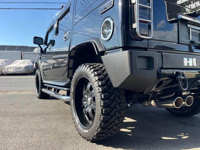 ハマーH2 ラグジュアリーパッケージ 新車並行/後期黒レザー/4本出しマフラー/ジオバンナ22インチ/LEDテール/バネサス/アルパインフリップダウンモニター/ドラレコ&レーダー/LEDヘッドライト&ナビ/LEDルーフマーカー(11枚目)