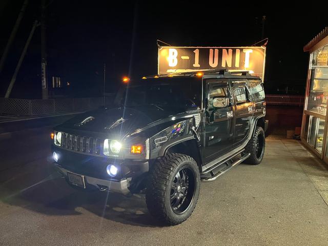 ハマーH2 ラグジュアリーパッケージ 新車並行/後期黒レザー/4本出しマフラー/ジオバンナ22インチ/LEDテール/バネサス/アルパインフリップダウンモニター/ドラレコ&レーダー/LEDヘッドライト&ナビ/LEDルーフマーカー(14枚目)