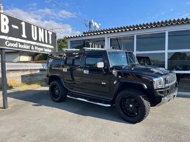 ハマーH2 ラグジュアリーパッケージ 新車並行/後期黒レザー/4本出しマフラー/ジオバンナ22インチ/LEDテール/バネサス/アルパインフリップダウンモニター/ドラレコ&レーダー/LEDヘッドライト&ナビ/LEDルーフマーカー(64枚目)