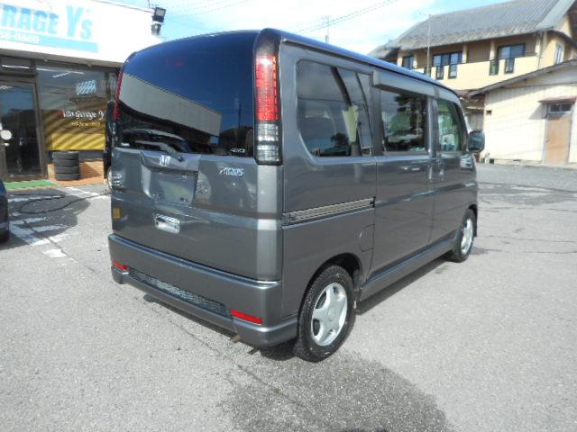 バモス L・スタイリッシュパッケージ 5速ミッション4WD ブラックインテリア リアヒーター車検9年11月両側スライド ABS付純正ナビ モデューロフロントバンパー オーバーヘッド収納(4枚目)