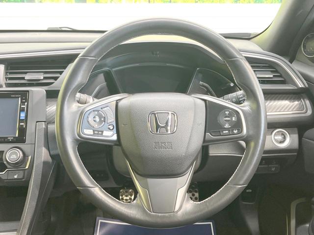 ハッチバック ホンダセンシング MT ターボ 純正ナビ バックカメラ アダプティブクルーズコントロール 純正18インチAW LEDヘッド シートヒーター オートハイビーム LEDフォグ 革巻きステアリング ETC 禁煙車(32枚目)