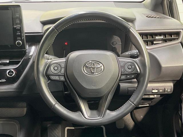 カローラ ハイブリッド ダブルバイビー ナビ機能付9インチディスプレイオーディオ ブラインドスポットモニター ハーフレザー 純正17インチアルミ レーダークルーズコントロール ETC2.0 バックカメラ オートハイビーム 禁煙車(11枚目)