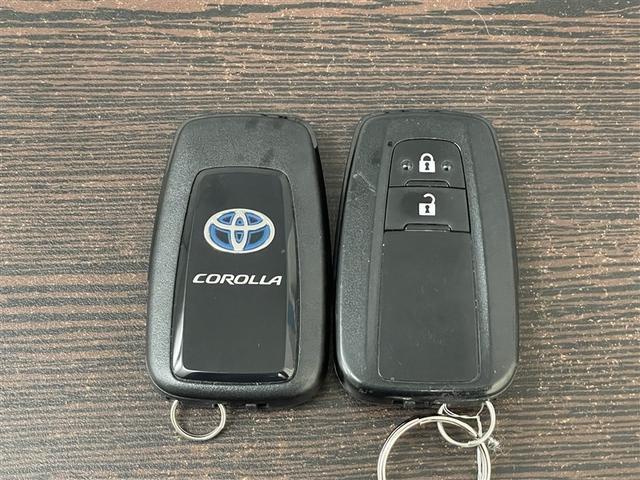 カローラツーリング ハイブリッド ダブルバイビー 追突軽減ブレーキ バックモニタ 地デジフルセグ DVD 横滑防止 ナビTV スマキー LEDライト デュアルエアバッグ エアコン オートクルーズ サイドエアバッグ ETC付 PS キーフリー ABS(38枚目)